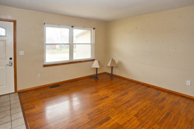 Welcome to this charming ranch home in Lakes of the Four Seasons on Lakes of the Four Seasons Country Club in Indiana - for sale on GolfHomes.com, golf home, golf lot