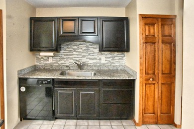 Welcome to this charming ranch home in Lakes of the Four Seasons on Lakes of the Four Seasons Country Club in Indiana - for sale on GolfHomes.com, golf home, golf lot