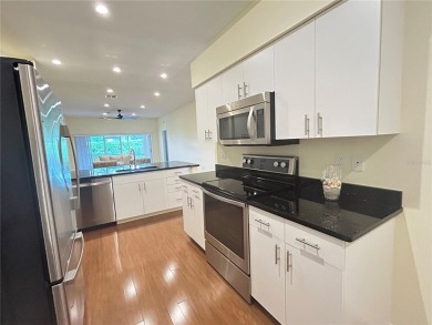 Fresh on the market is this meticulously maintained and on Cypresswood Golf and Country Club in Florida - for sale on GolfHomes.com, golf home, golf lot