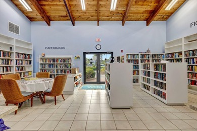 This beautifully maintained 1-bedroom, 1-bath residence offers on Ocean Village Golf Course in Florida - for sale on GolfHomes.com, golf home, golf lot