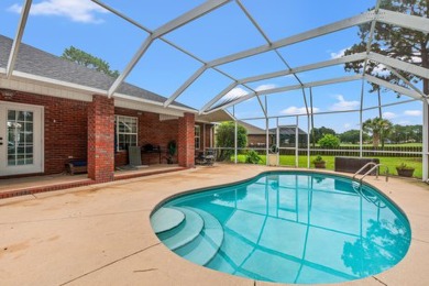 Step right up to this four-bedroom, three-bathroom gem nestled on Emerald Bay Golf Club in Florida - for sale on GolfHomes.com, golf home, golf lot