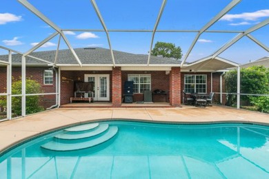 Step right up to this four-bedroom, three-bathroom gem nestled on Emerald Bay Golf Club in Florida - for sale on GolfHomes.com, golf home, golf lot