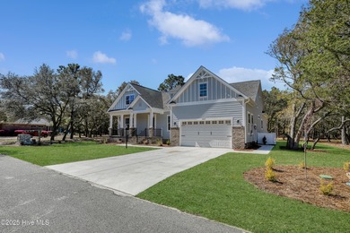 Cradled by the gentle currents where the Shallotte River meets on Lockwood Folly Country Club in North Carolina - for sale on GolfHomes.com, golf home, golf lot