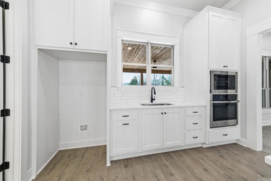 Beautiful New 5BR 3.5BA 3 Car Garage on 1/2 AC lot in Augusta on Rolling Hills Country Club Inc in Arkansas - for sale on GolfHomes.com, golf home, golf lot