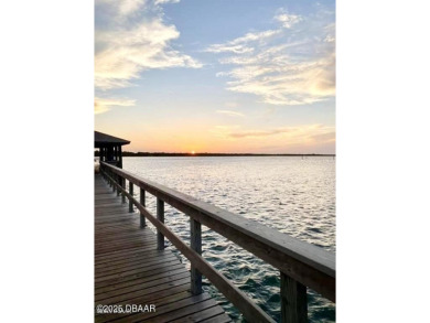 Bright and cheerful 3 bedroom corner unit overlooks marsh and on Harbour Village Golf and Yacht Club in Florida - for sale on GolfHomes.com, golf home, golf lot