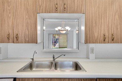 Introducing 2504 Antigua Terrace, a beautifully updated 2BR/2BA on Wynmoor Golf Course in Florida - for sale on GolfHomes.com, golf home, golf lot