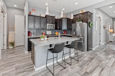 Welcome to this impeccably maintained home nestled in the highly on Verrado Golf Club  in Arizona - for sale on GolfHomes.com, golf home, golf lot