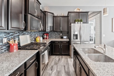 Welcome to this impeccably maintained home nestled in the highly on Verrado Golf Club  in Arizona - for sale on GolfHomes.com, golf home, golf lot
