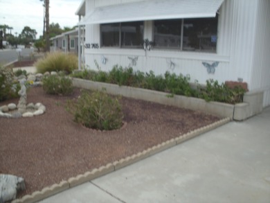 This well-maintained Double wide manufactured home 2-bedroom 1 & on The Club At Shenandoah Springs in California - for sale on GolfHomes.com, golf home, golf lot