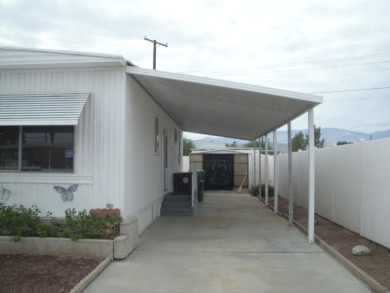 This well-maintained Double wide manufactured home 2-bedroom 1 & on The Club At Shenandoah Springs in California - for sale on GolfHomes.com, golf home, golf lot