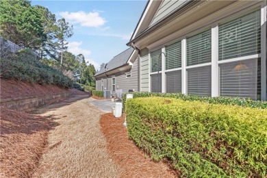 Stunning beauty surrounds this graceful home nestled in sought on Brookstone Golf and Country Club in Georgia - for sale on GolfHomes.com, golf home, golf lot