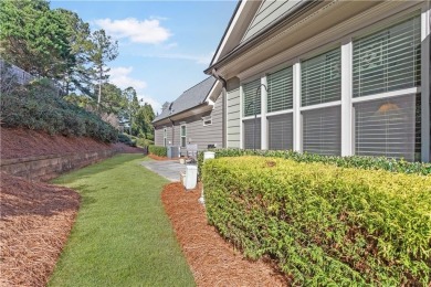 Stunning beauty surrounds this graceful home nestled in sought on Brookstone Golf and Country Club in Georgia - for sale on GolfHomes.com, golf home, golf lot