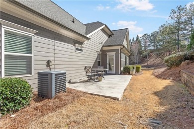 Stunning beauty surrounds this graceful home nestled in sought on Brookstone Golf and Country Club in Georgia - for sale on GolfHomes.com, golf home, golf lot