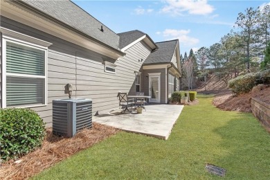 Stunning beauty surrounds this graceful home nestled in sought on Brookstone Golf and Country Club in Georgia - for sale on GolfHomes.com, golf home, golf lot