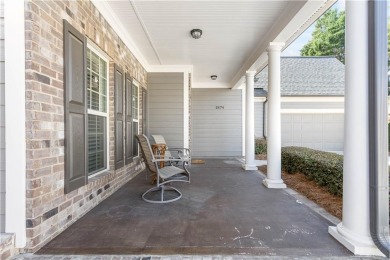 Stunning beauty surrounds this graceful home nestled in sought on Brookstone Golf and Country Club in Georgia - for sale on GolfHomes.com, golf home, golf lot