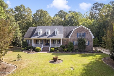 This beautifully maintained brick ranch is ready for its next on Sound Golf Links at Albemarle Plantation in North Carolina - for sale on GolfHomes.com, golf home, golf lot