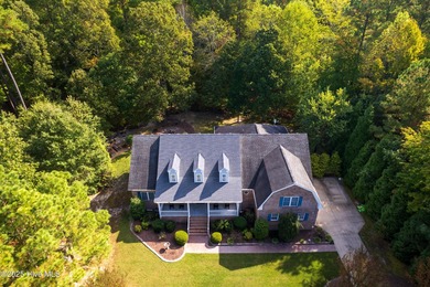 This beautifully maintained brick ranch is ready for its next on Sound Golf Links at Albemarle Plantation in North Carolina - for sale on GolfHomes.com, golf home, golf lot