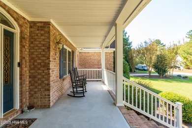 This beautifully maintained brick ranch is ready for its next on Sound Golf Links at Albemarle Plantation in North Carolina - for sale on GolfHomes.com, golf home, golf lot