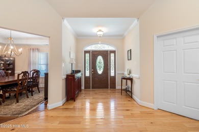 This beautifully maintained brick ranch is ready for its next on Sound Golf Links at Albemarle Plantation in North Carolina - for sale on GolfHomes.com, golf home, golf lot