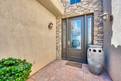 Experience luxury living in this stunning custom-built home on The Refuge Golf and Country Club in Arizona - for sale on GolfHomes.com, golf home, golf lot