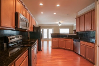 This is a Gorgeous Three-story End Unit Townhome in the charming on Collins Hill Golf Club in Georgia - for sale on GolfHomes.com, golf home, golf lot