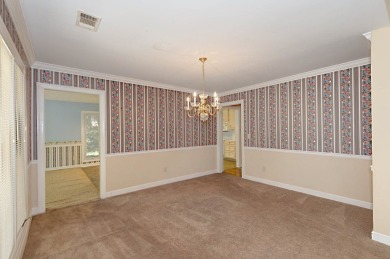 This charming 3-bedroom, 2.5-bath home sits right on the golf on Maple Ridge Golf Club in Georgia - for sale on GolfHomes.com, golf home, golf lot