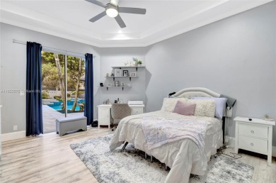 This is unbeatable Boca value! Oversized 17,049 SF lot + newer on Woodfield Country Club in Florida - for sale on GolfHomes.com, golf home, golf lot