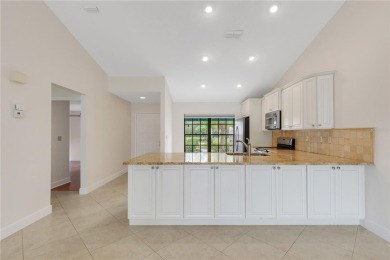 Expansive Golf Course views captures your attention as soon as on University Park Country Club in Florida - for sale on GolfHomes.com, golf home, golf lot