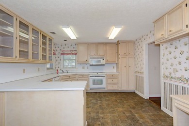 This charming 3-bedroom, 2.5-bath home sits right on the golf on Maple Ridge Golf Club in Georgia - for sale on GolfHomes.com, golf home, golf lot