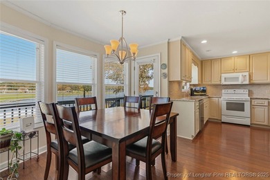 Waterfront home with stunning views located in the gated and on Carolina Trace Country Club in North Carolina - for sale on GolfHomes.com, golf home, golf lot