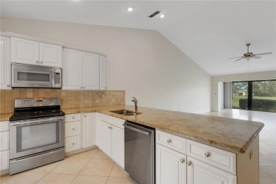 Expansive Golf Course views captures your attention as soon as on University Park Country Club in Florida - for sale on GolfHomes.com, golf home, golf lot