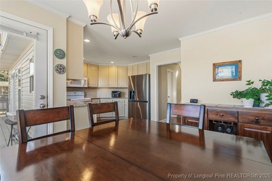 Waterfront home with stunning views located in the gated and on Carolina Trace Country Club in North Carolina - for sale on GolfHomes.com, golf home, golf lot