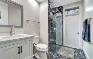 This is unbeatable Boca value! Oversized 17,049 SF lot + newer on Woodfield Country Club in Florida - for sale on GolfHomes.com, golf home, golf lot
