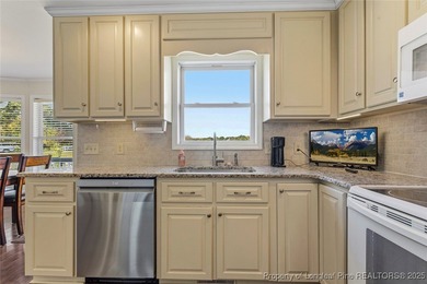 Waterfront home with stunning views located in the gated and on Carolina Trace Country Club in North Carolina - for sale on GolfHomes.com, golf home, golf lot