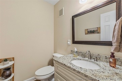 Waterfront home with stunning views located in the gated and on Carolina Trace Country Club in North Carolina - for sale on GolfHomes.com, golf home, golf lot