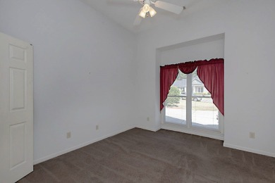 This charming 3-bedroom, 2.5-bath home sits right on the golf on Maple Ridge Golf Club in Georgia - for sale on GolfHomes.com, golf home, golf lot
