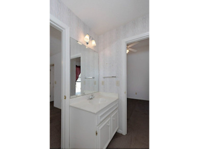 This charming 3-bedroom, 2.5-bath home sits right on the golf on Maple Ridge Golf Club in Georgia - for sale on GolfHomes.com, golf home, golf lot