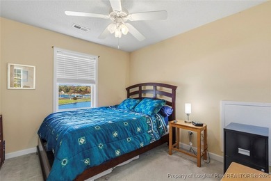 Waterfront home with stunning views located in the gated and on Carolina Trace Country Club in North Carolina - for sale on GolfHomes.com, golf home, golf lot