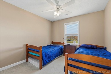 Waterfront home with stunning views located in the gated and on Carolina Trace Country Club in North Carolina - for sale on GolfHomes.com, golf home, golf lot