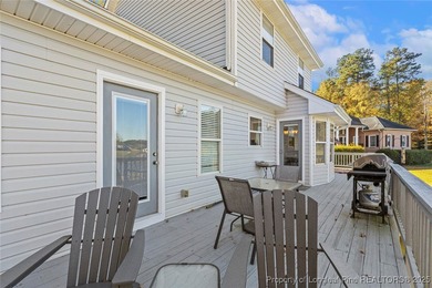 Waterfront home with stunning views located in the gated and on Carolina Trace Country Club in North Carolina - for sale on GolfHomes.com, golf home, golf lot