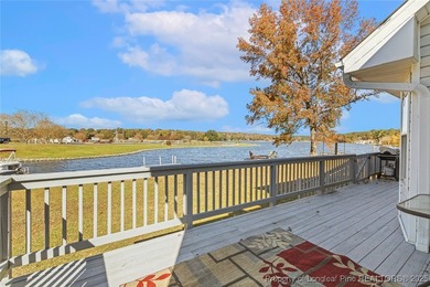 Waterfront home with stunning views located in the gated and on Carolina Trace Country Club in North Carolina - for sale on GolfHomes.com, golf home, golf lot