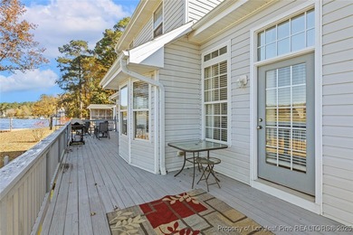 Waterfront home with stunning views located in the gated and on Carolina Trace Country Club in North Carolina - for sale on GolfHomes.com, golf home, golf lot