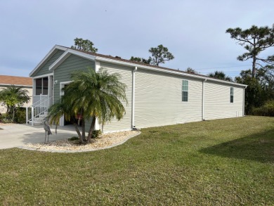 Indulge in the pinnacle of luxurious living within this on Blue Heron Pines Golf Course in Florida - for sale on GolfHomes.com, golf home, golf lot
