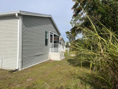 Indulge in the pinnacle of luxurious living within this on Blue Heron Pines Golf Course in Florida - for sale on GolfHomes.com, golf home, golf lot