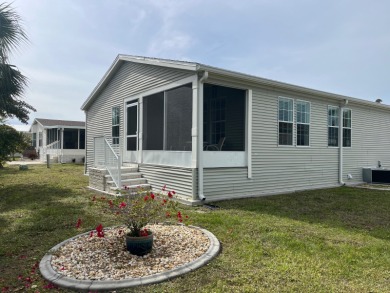 Indulge in the pinnacle of luxurious living within this on Blue Heron Pines Golf Course in Florida - for sale on GolfHomes.com, golf home, golf lot