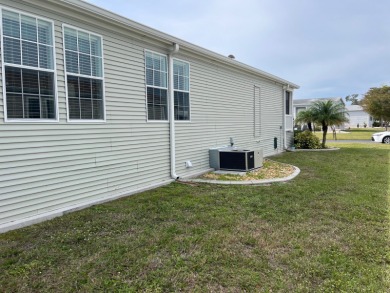 Indulge in the pinnacle of luxurious living within this on Blue Heron Pines Golf Course in Florida - for sale on GolfHomes.com, golf home, golf lot