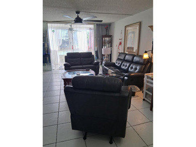 Welcome to this well maintained and inviting second floor condo on Sunrise Lakes Phase IV Golf Course in Florida - for sale on GolfHomes.com, golf home, golf lot