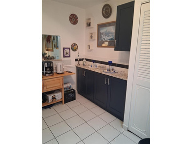 Welcome to this well maintained and inviting second floor condo on Sunrise Lakes Phase IV Golf Course in Florida - for sale on GolfHomes.com, golf home, golf lot