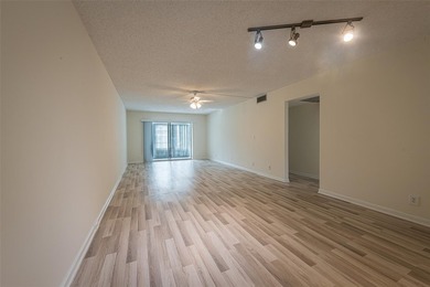 Nestled in the vibrant heart of Wynmoor, an adult community that on Wynmoor Golf Course in Florida - for sale on GolfHomes.com, golf home, golf lot