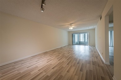 Nestled in the vibrant heart of Wynmoor, an adult community that on Wynmoor Golf Course in Florida - for sale on GolfHomes.com, golf home, golf lot